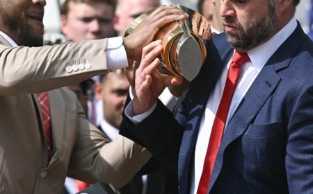 JD Vance drops Ohio State's national football trophy during White House celebration